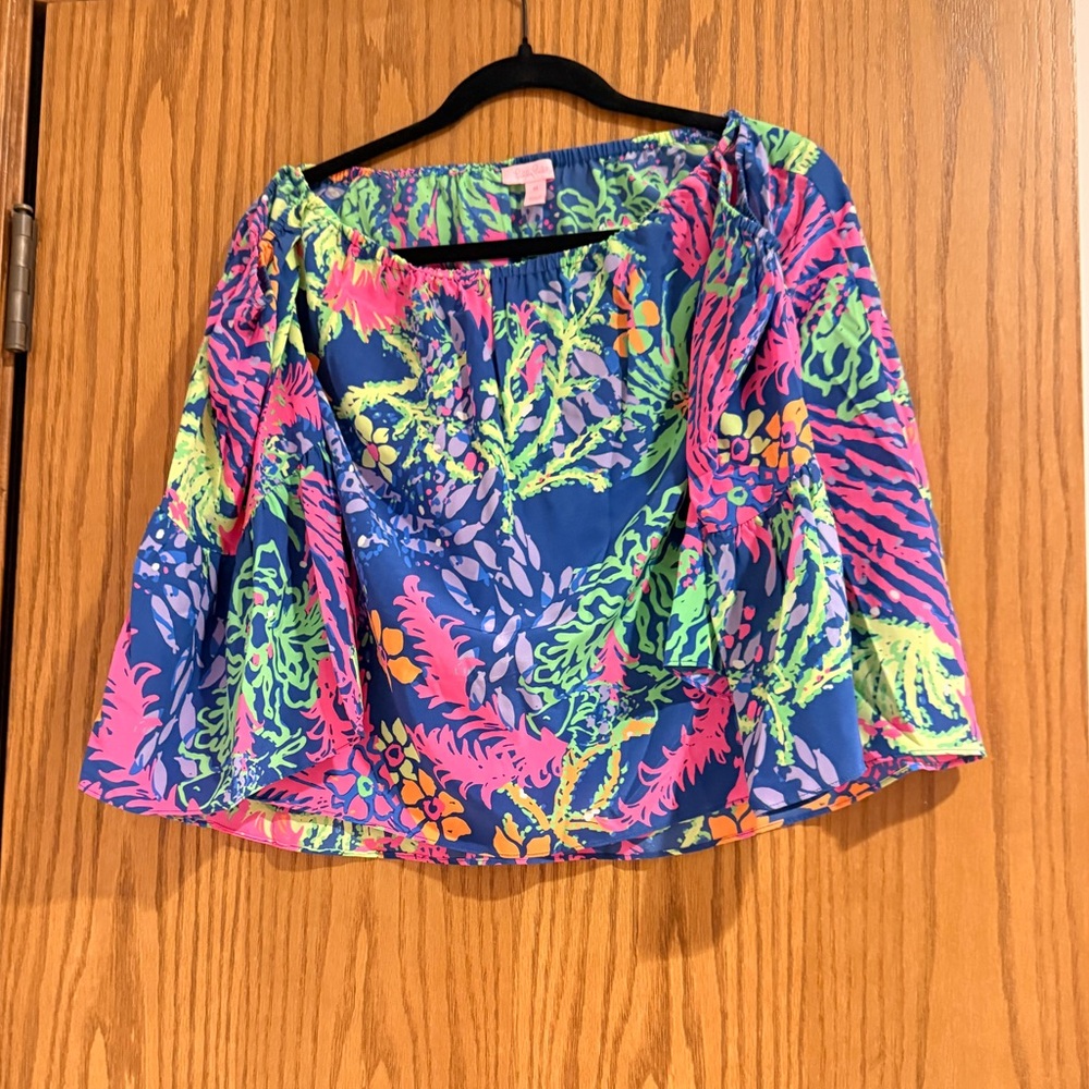 Lilly Pulitzer  off-the-shoulder top in the "Indigo All A Glow" print.